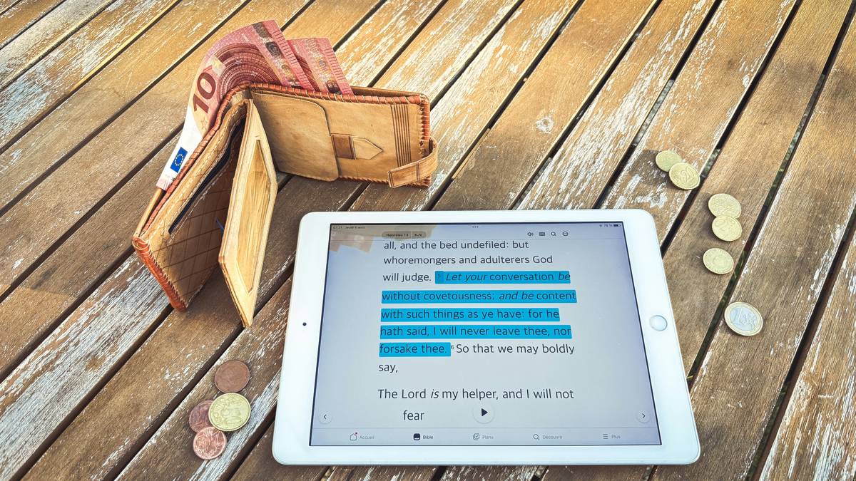 tips on better spending habits illustrated with a hand holding a simple journal next to a credit card and coffee cup, symbolizing mindful choice over autopilot